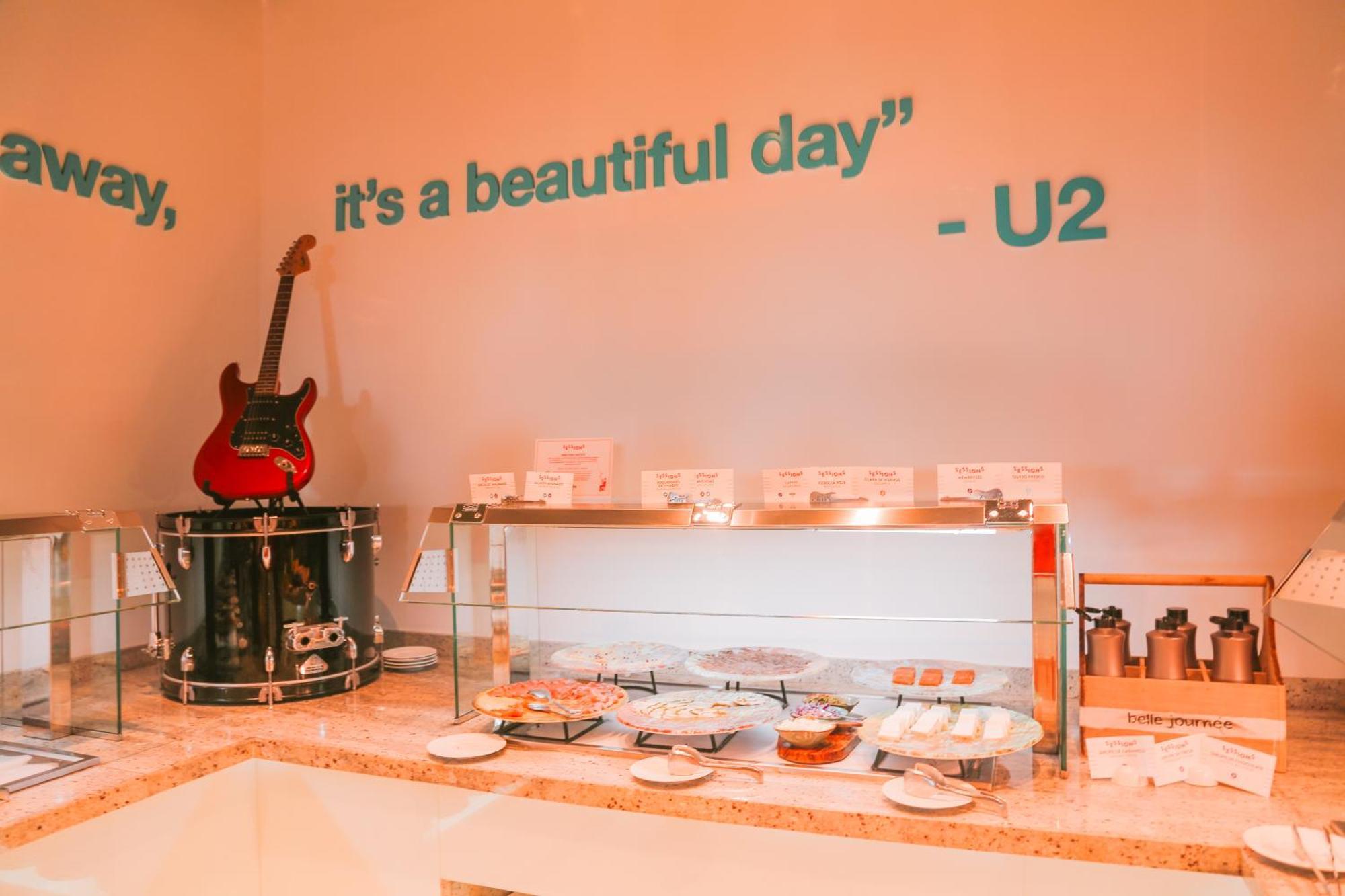Hard Rock Hotel Ibiza Playa d'en Bossa Kültér fotó A quote from U2's "Beautiful Day" on the wall of a coffee shop in Vienna, Austria